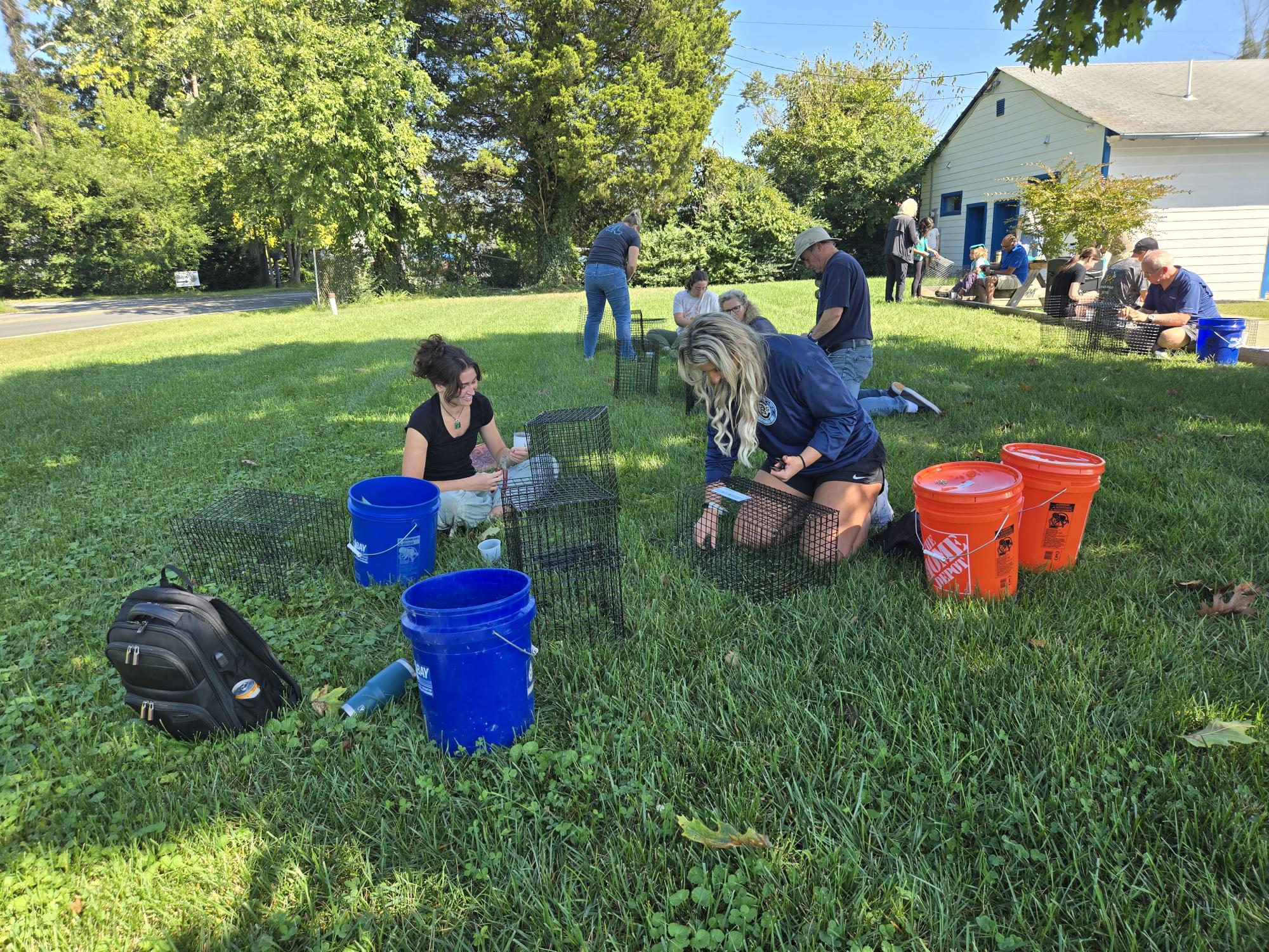 OESRM Oyster Gardening - The Maryland Transportation Authority's Office of Environment, Safety, and Risk Management participate in the Chesapeake Bay Foundation's Oyster Gardening Program. Photo shows staff constructing oyster cages.